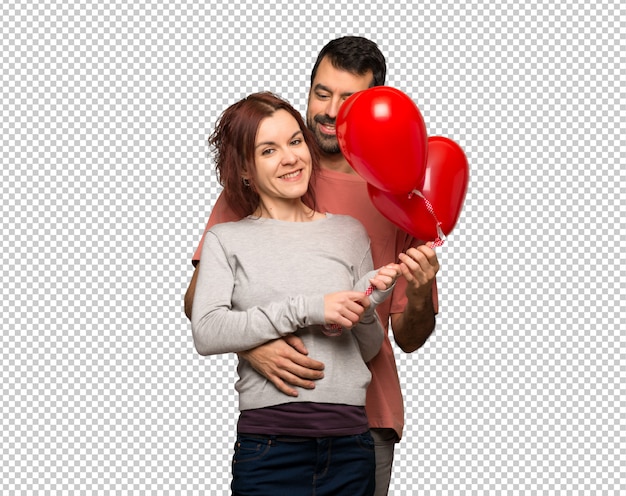 Couple En Saint Valentin Avec Des Ballons En Forme De Cœur