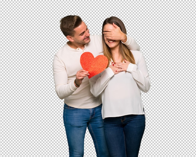 Couple En Saint Valentin Tenant Un Symbole Du Coeur