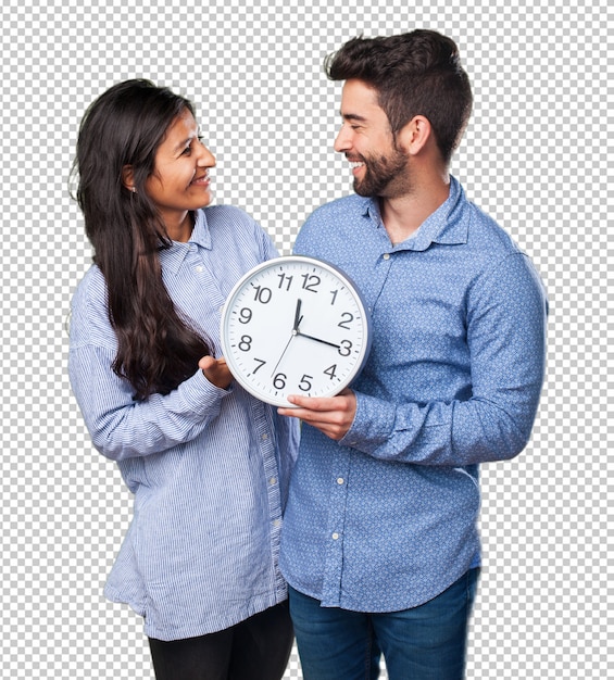 Couplg jovem segurando um relógio
