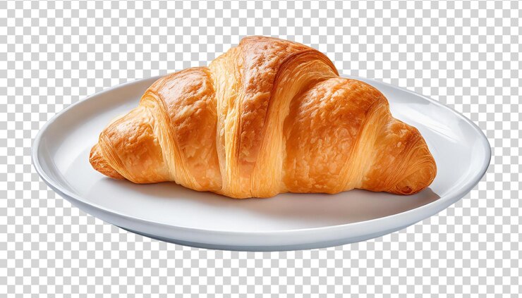 Croissant auf einem weißen Teller, isoliert auf einem transparenten Hintergrund