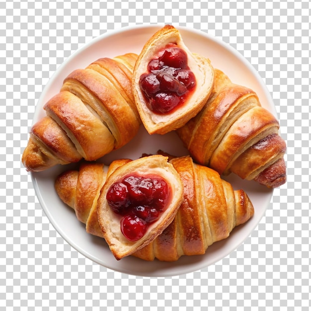 PSD croissants con conservas de fresa en un plato blanco aislado sobre un fondo transparente