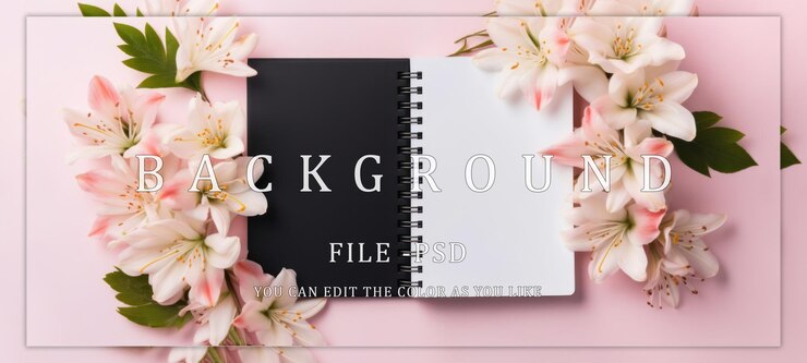 PSD un cuaderno en blanco rodeado de delicadas flores rosadas