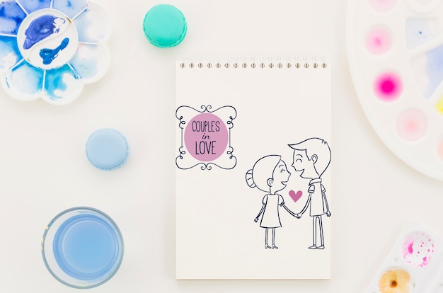 PSD cuaderno con dibujo de pareja de enamorados