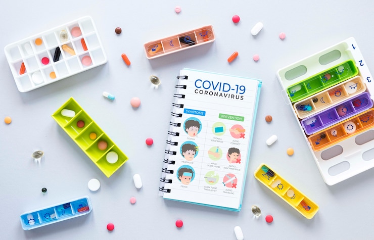 PSD cuaderno de maquetas junto a pastillas