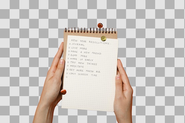 Cuaderno de resoluciones de año nuevo de PNG con decoración de año nuevo aislada sobre fondo blanco