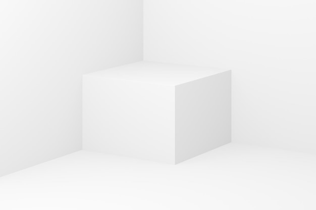 Un cube blanc minimaliste dans un studio propre et vide