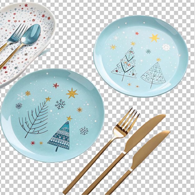 cubiertos y un plato azul de Navidad en un fondo transparente