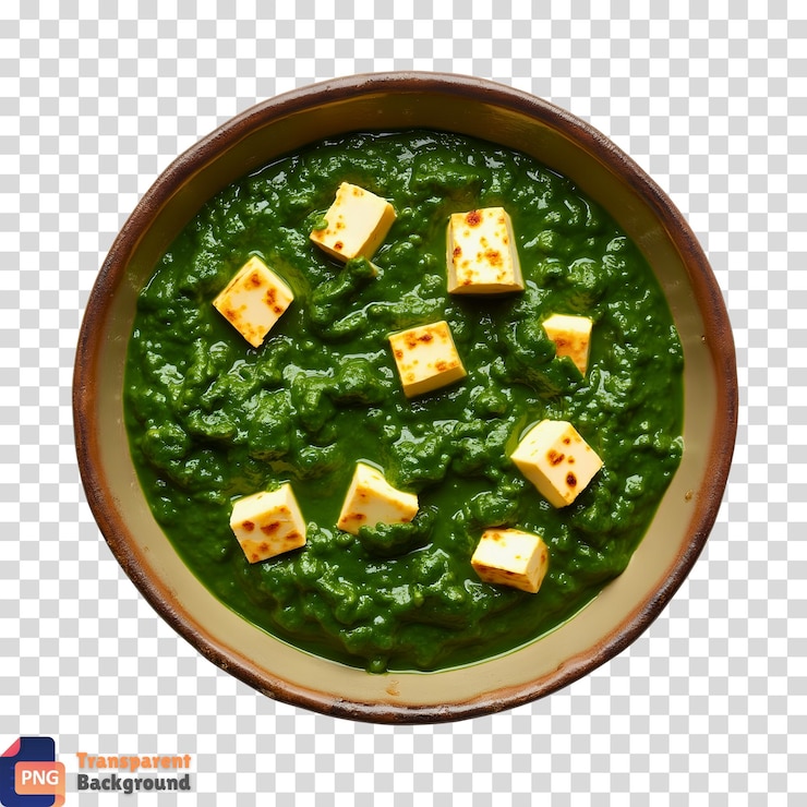 PSD curry de espinacas con cubos de queso presentado en un cuenco tradicional