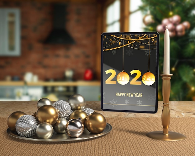 PSD decoraciones de noche de año nuevo junto a la tableta