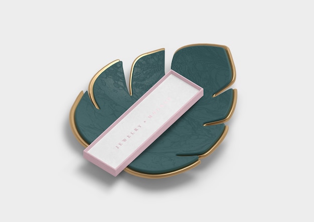 Dekorationsblatt mit rosa Geschenkbox