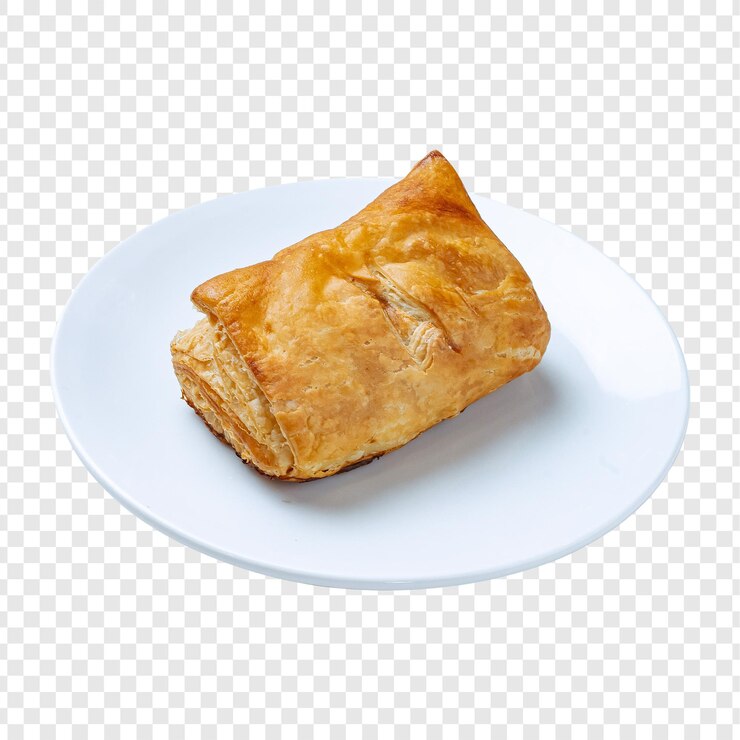 PSD deliciosa pastelaria dourada assada num prato branco