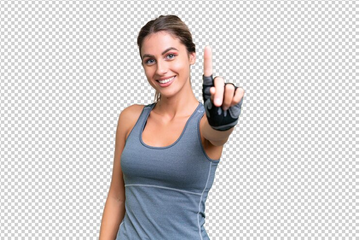 PSD deporte mujer uruguaya bonita sobre el fondo aislado mostrando y levantando un dedo
