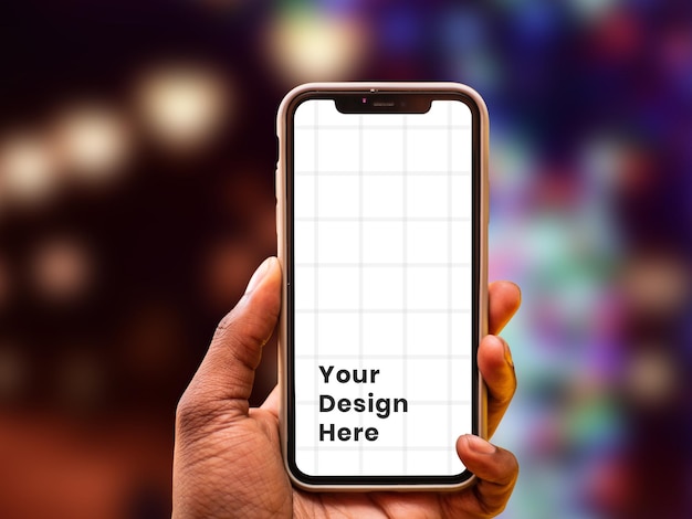 PSD desfoque de fundo na maquete de smartphone de mãos