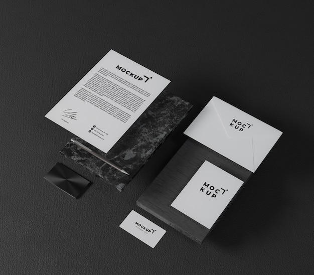 Design de maquete de artigos de papelaria estilo preto
