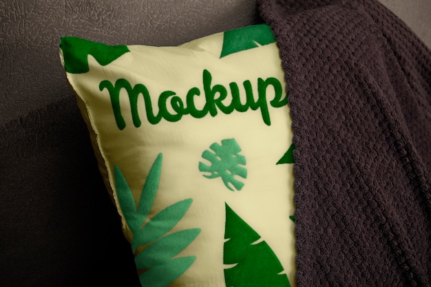 Design mock-up del cuscino con motivo a foglie