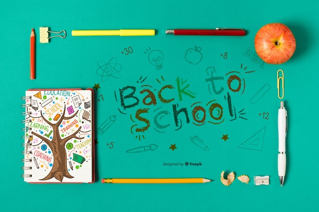 Dessus de fournitures scolaires avec dessin