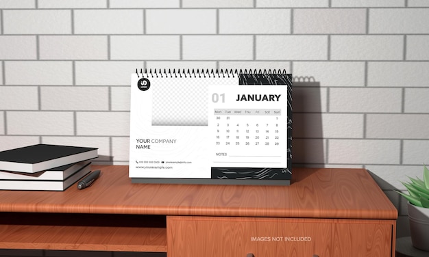 PSD diseño de calendario de escritorio anual 3d con pluma de libros sobre mesa sobre fondo de pared de ladrillo gris