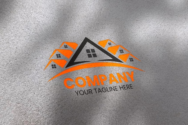 Diseño de logotipo con casas estilizadas con colores vibrantes y eslogan pegadizo