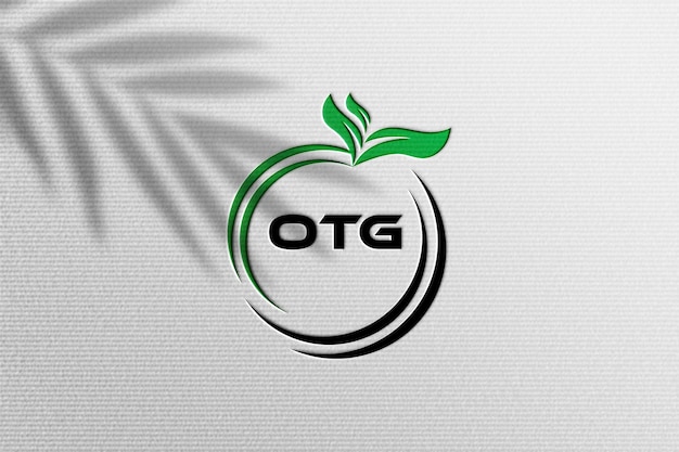 Diseño del logotipo de Otg con hojas verdes y emblema circular