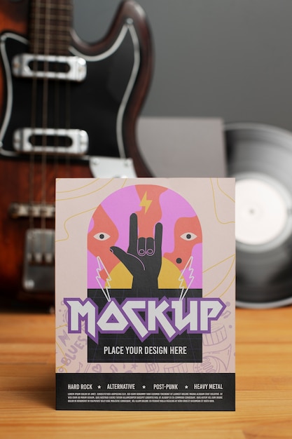 Diseño de maqueta de póster de evento musical con guitarra y vinilo.