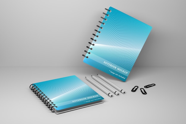 PSD de dos cuadernos de cuadernos de espiral de oficina, tres lápices de carbón y alfileres de papel