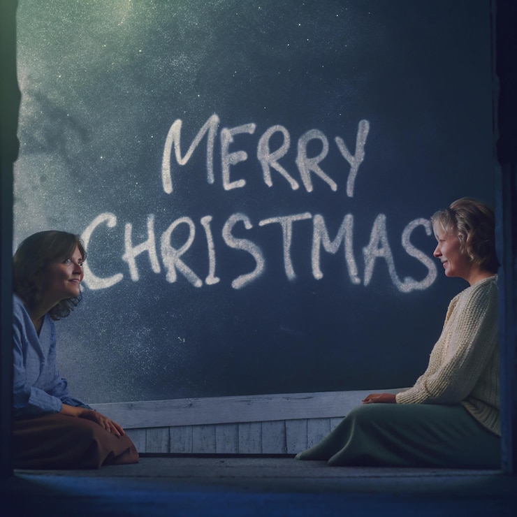 PSD dos personas sentadas en una repisa una de ellas tiene un cartel que dice feliz navidad