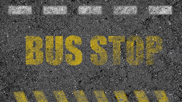 Effet de texte d'arrêt de bus sur la route peinte