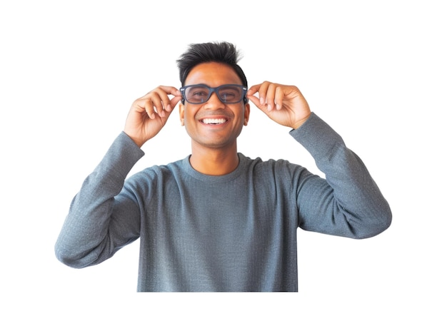 Ein junger indischer Mann wirft eine Brille in den Mülleimer, nachdem er eine Lasertherapie durch medizinische Sehkraft durchlaufen hat. Er lächelt und schaut in die Kamera, um sich zu heilen.