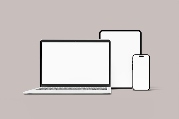 Ein Laptop und ein Tablet stehen nebeneinander, ein Tablet daneben.