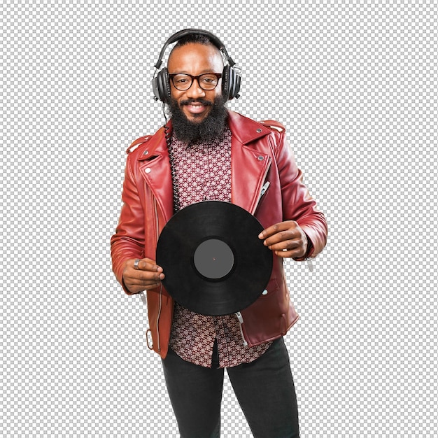 Ein Mann lächelt mit Kopfhörern und einer Vinylplatte