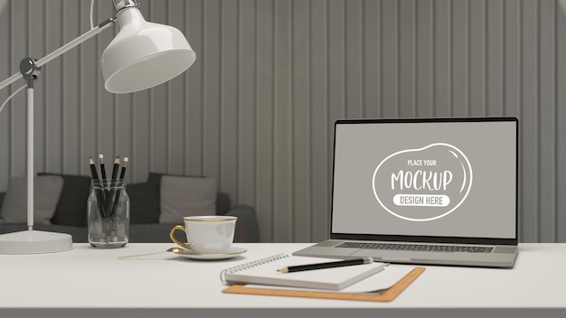 Einfacher Arbeitsplatz im Wohnzimmer mit Laptop-Schreibwarenlampe und Kaffeetasse 3D-Rendering