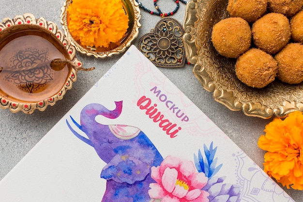 Elefante e cibo di festival indù di diwali mock-up