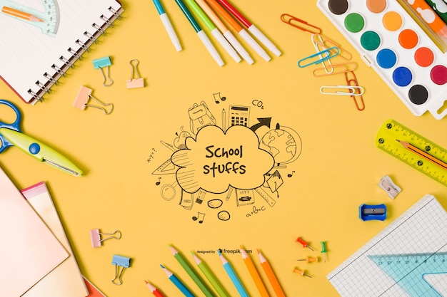 Elementi scolastici piatti laici con disegno
