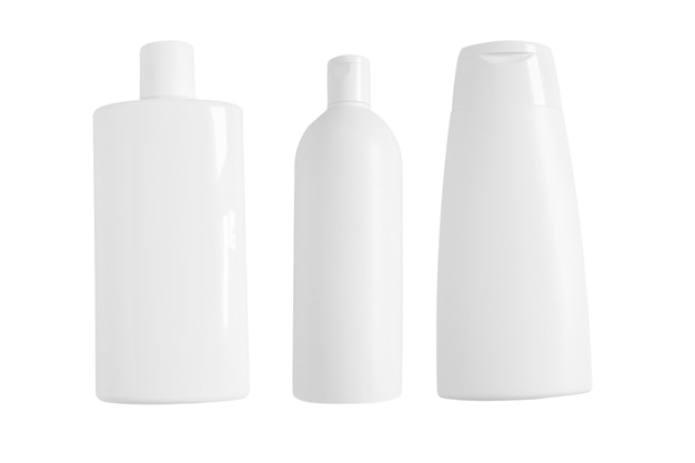 Ensemble de bouteilles de cosmétiques sur fond blanc