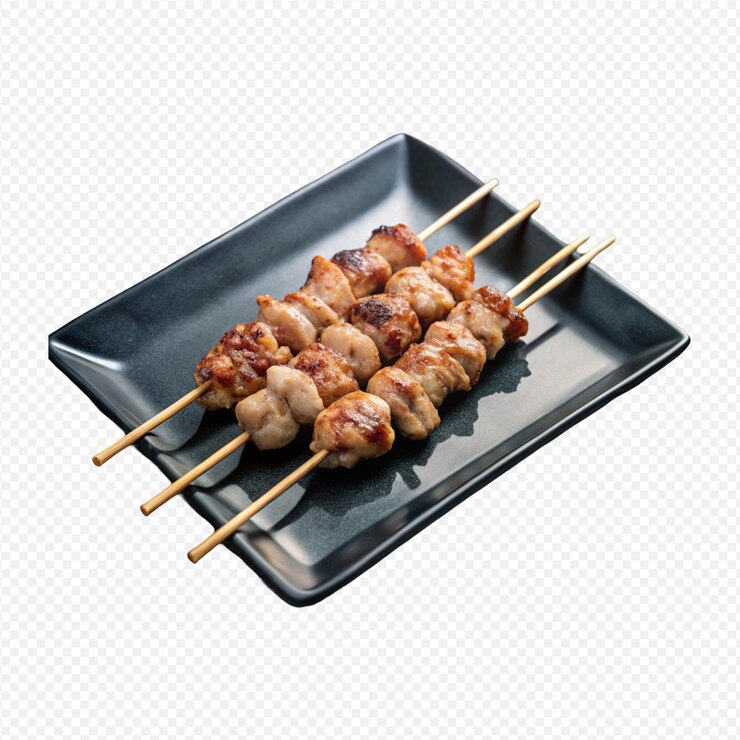 PSD espigas de pollo a la parrilla yakitori placa de cerámica verde palos de bambú hojas de lechuga