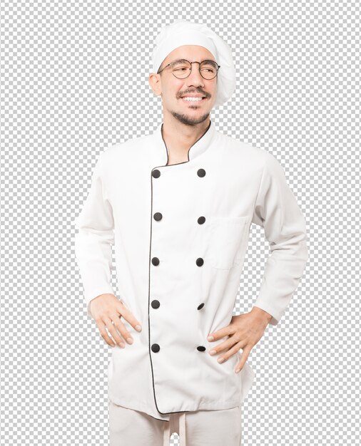 PSD feliz jovem chef posando contra o fundo