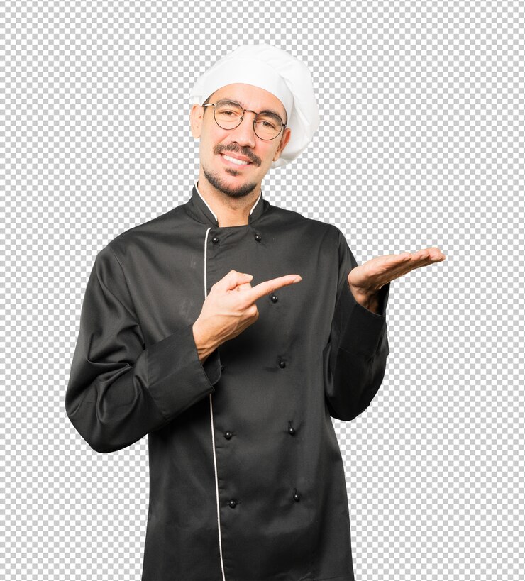 Feliz jovem chef segurando algo com a mão