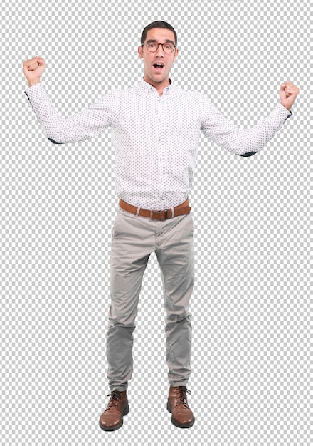 Feliz joven celebrando con los puños arriba - Full body shot