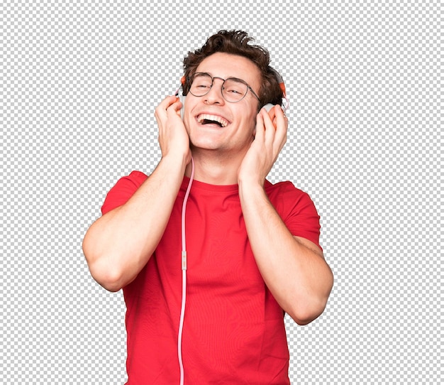 Feliz joven usando auriculares