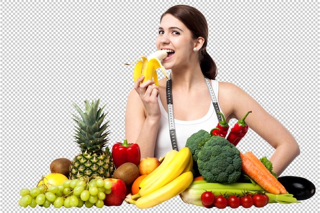 une femme mange des bananes et un tas de fruits