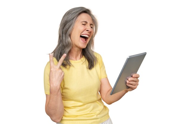 Femme Senior Excitée Avec La Technologie