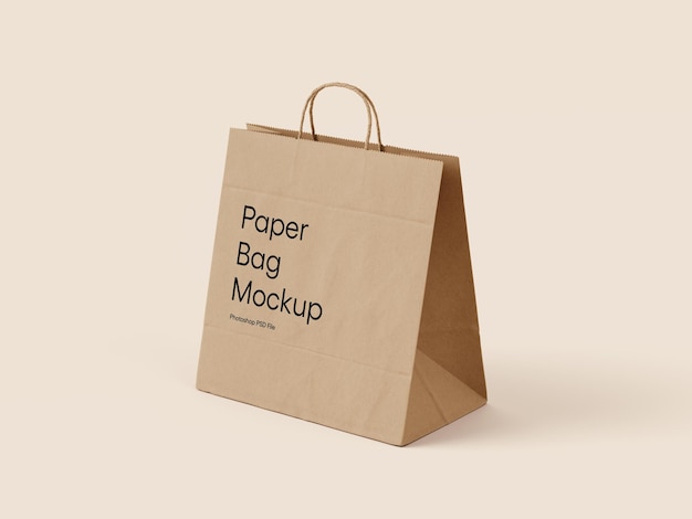 Un fichier photoshop de mock-up de sac en papier brun avec une impression noire