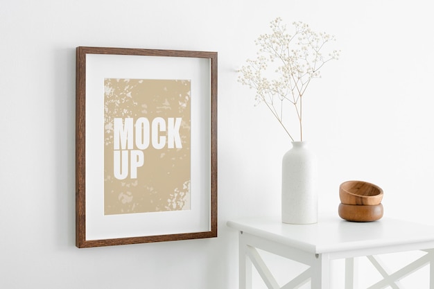 PSD foto de retrato ou maquete de quadro de arte na parede branca e móveis com planta de gipsófila seca em um vaso