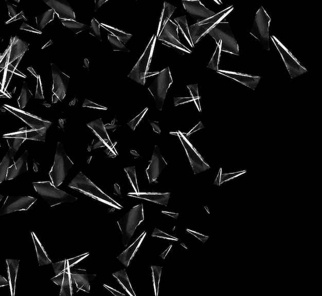Fragmentos de vidrio destrozados sobre un fondo negro