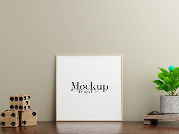 Frame di poster con dadi di legno e pianta