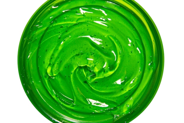 PSD gel cosmético verde transparente en un frasco redondo sobre un fondo vacío