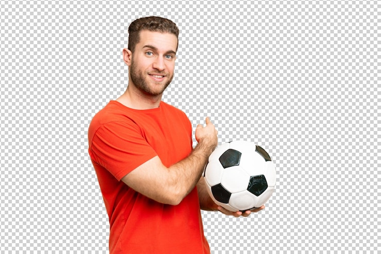 PSD giovane giocatore di calcio bello uomo sopra isolato chroma chiave sfondo puntando indietro