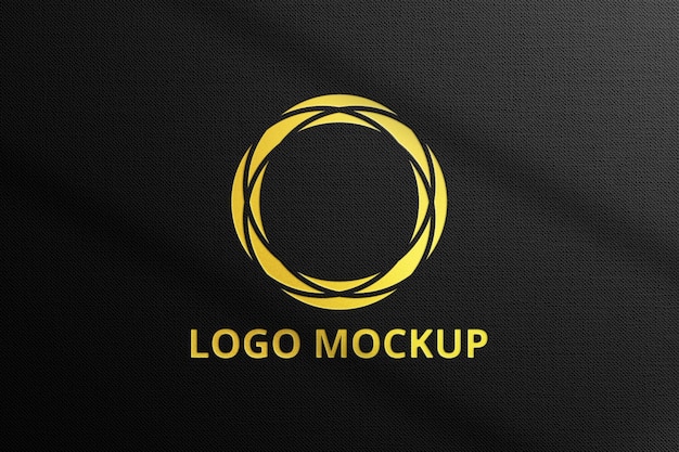 Goldfolien-Logo-Modell auf schwarzem Stoff