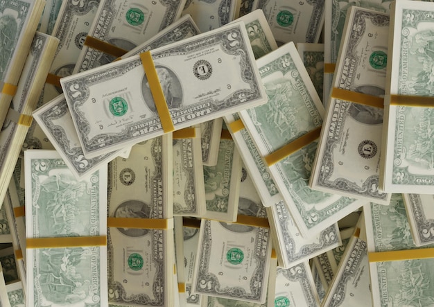 Grande mucchio di due banconote da un dollaro degli Stati Uniti risoluzione di grandi dimensioni per lo sfondo delle notizie di finanza aziendale