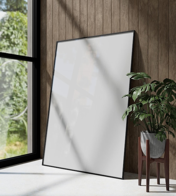 großes Holzrahmen-Mockup-Poster, das sich an der Holzwand mit Innenpflanzendekoration lehnt